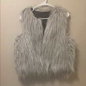 The limited grey fur vest medium/large